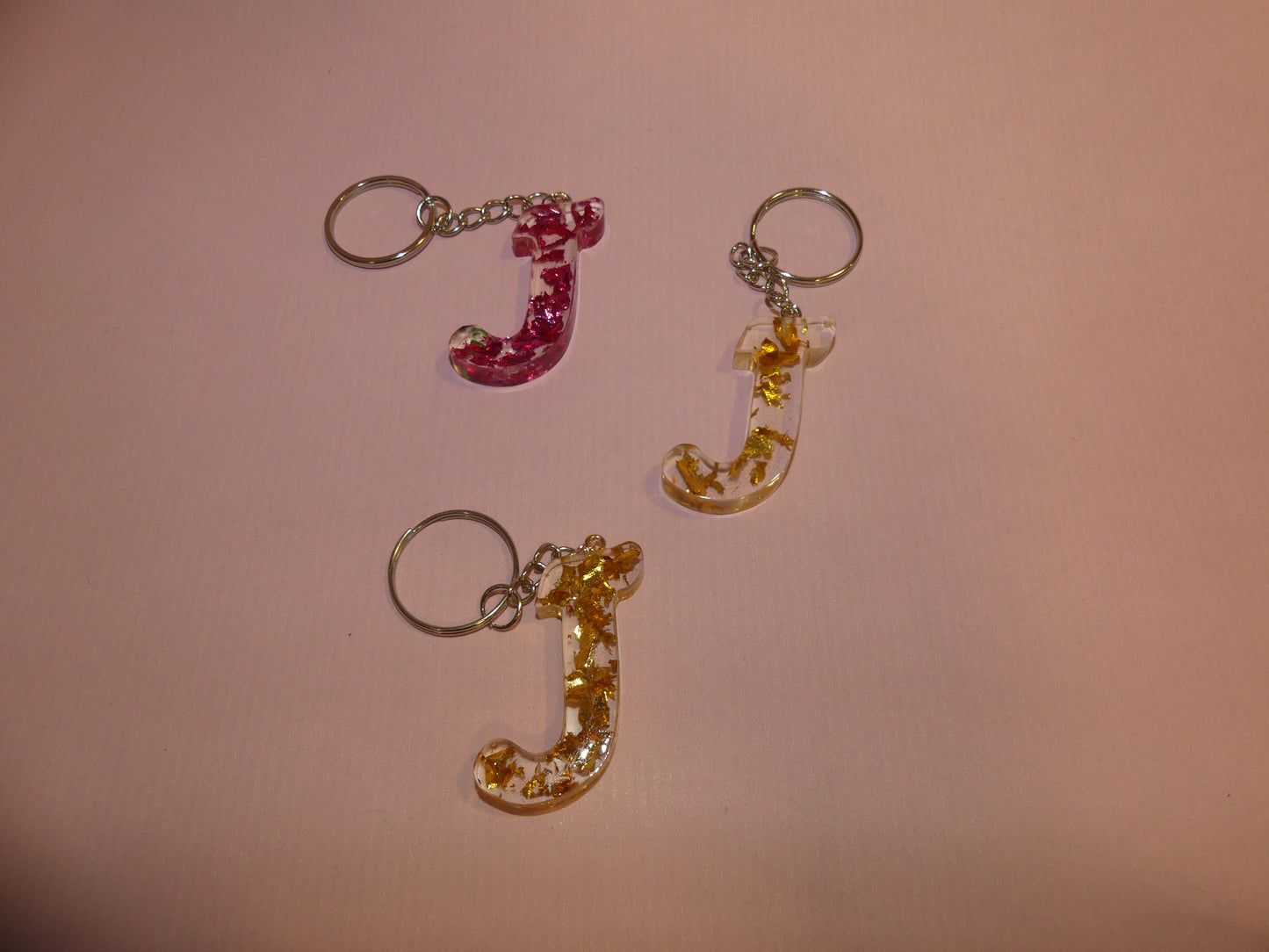 Porte-clefs Alphabet J transparent/feuilles d'or dorées