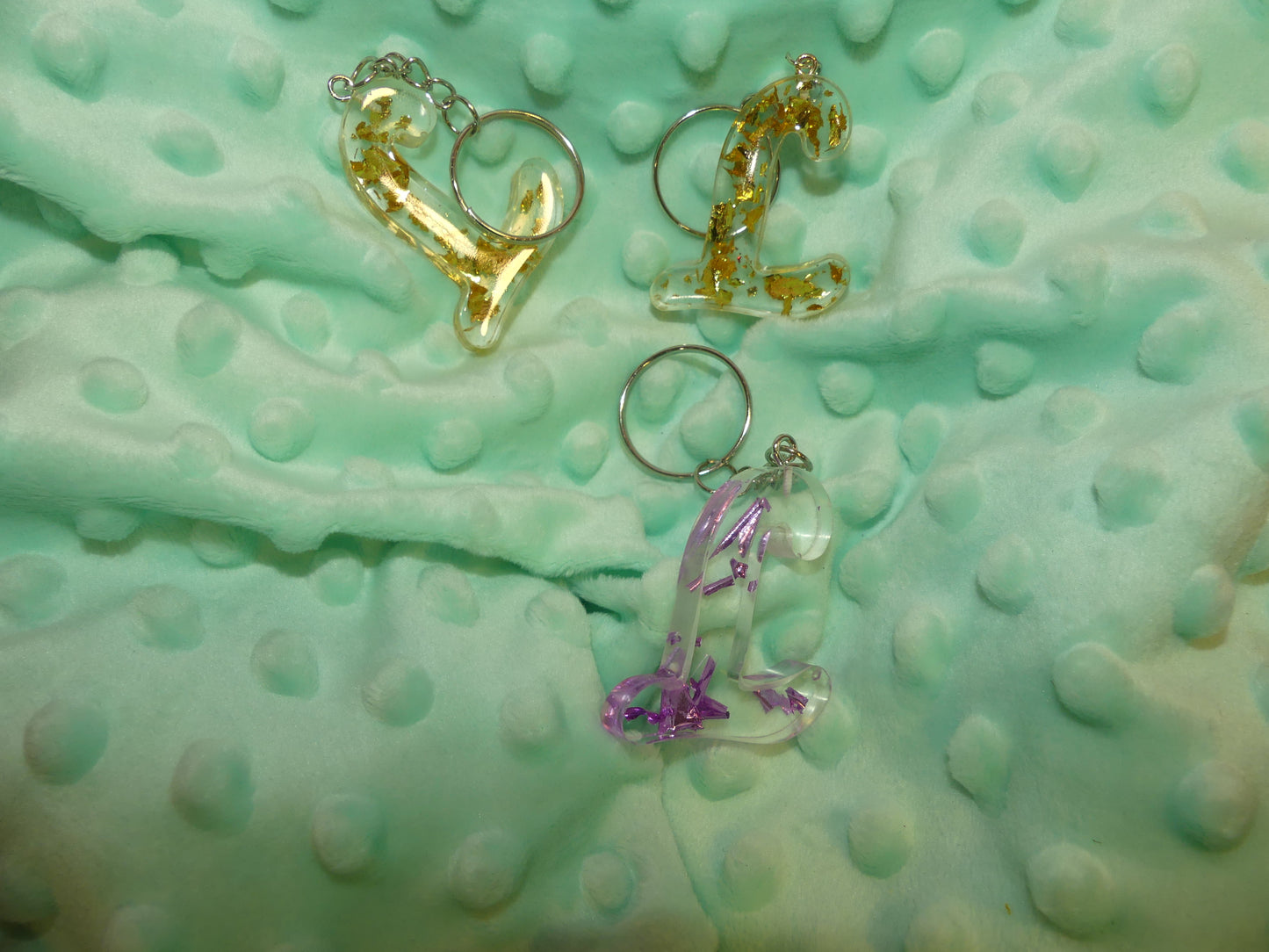 Porte-clefs Alphabet L transparent/feuilles d'or violettes