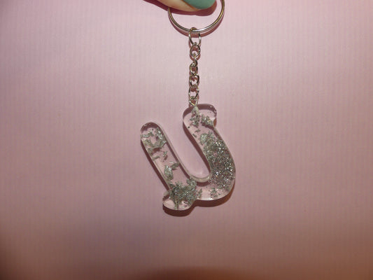 Porte-clefs Alphabet U transparent/feuilles d'or grises/paillettes